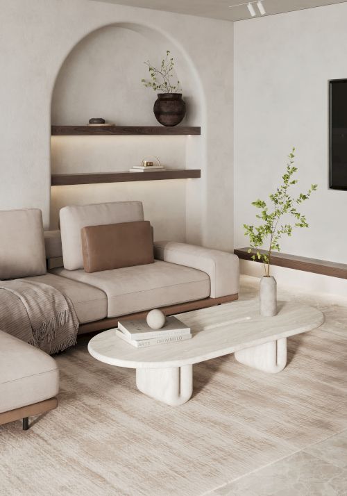 The image shows a modern living room with a beige sectional sofa, a white coffee table, built-in shelves, a plant, and neutral decor.